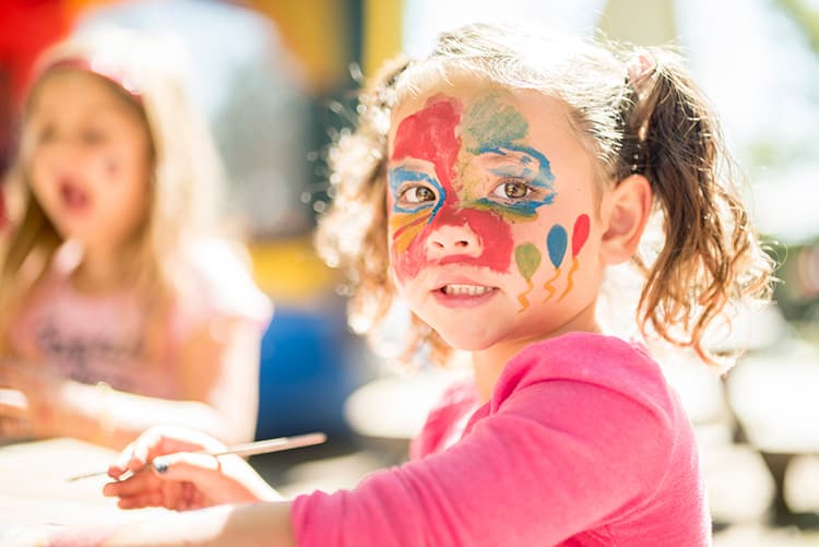 child with face paint