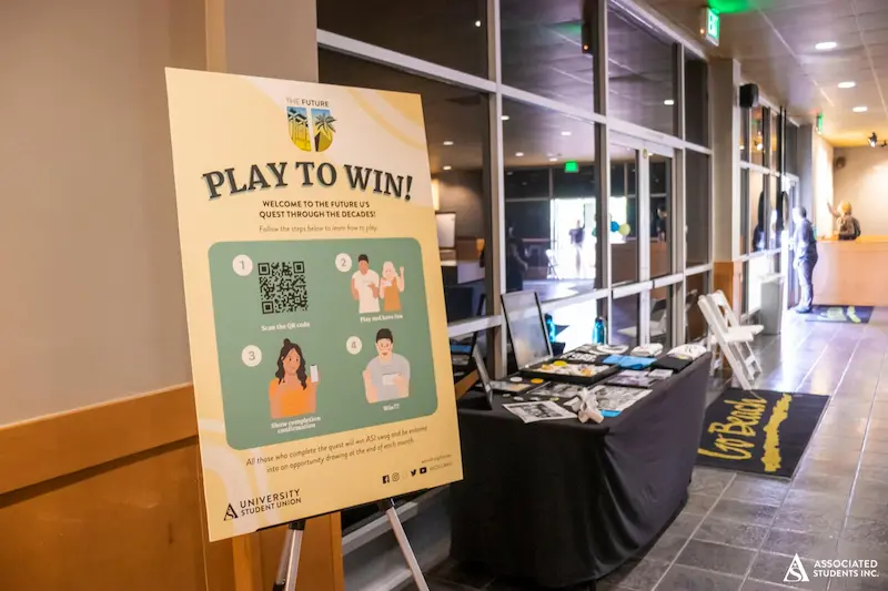 Poster stating "Play to Win"