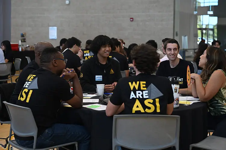 student roundtable meeting with architects