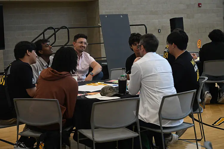 students speaking with architects