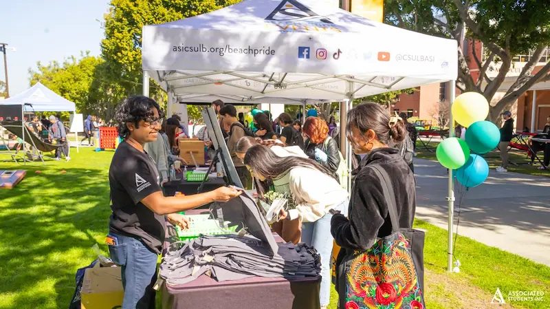 staff showing off objects