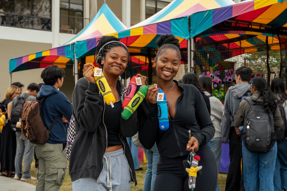 Students at block party with prizes
