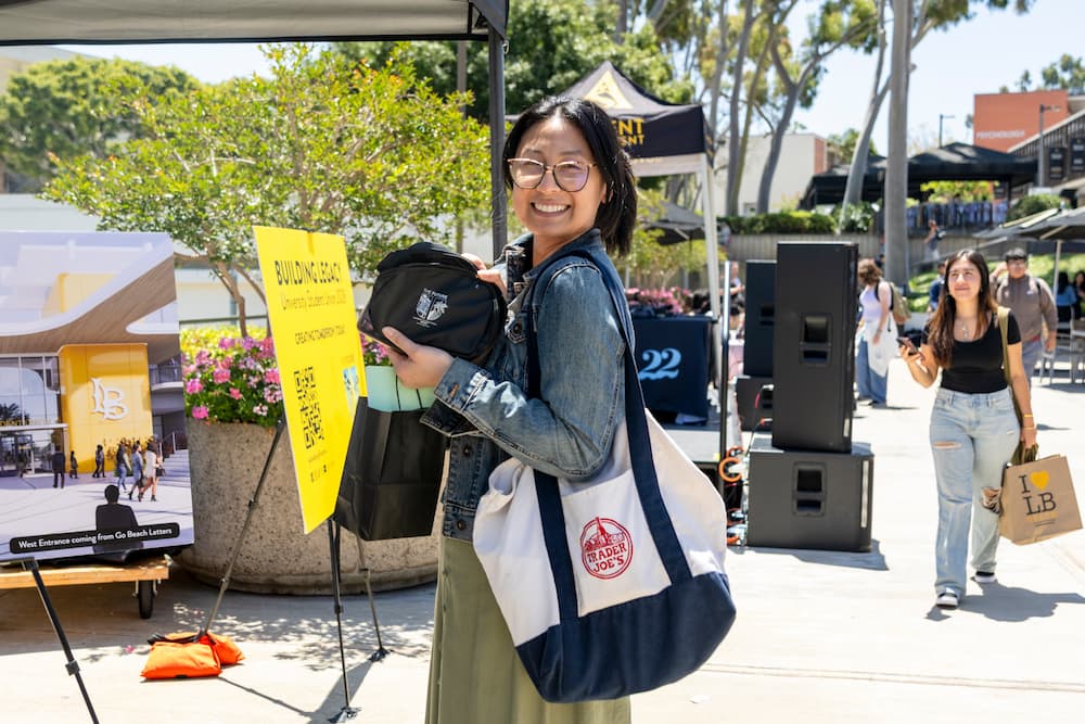 Student with swag at Pawsitive Finals Week event