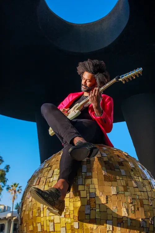 Reverend Doctor sitting on structure
